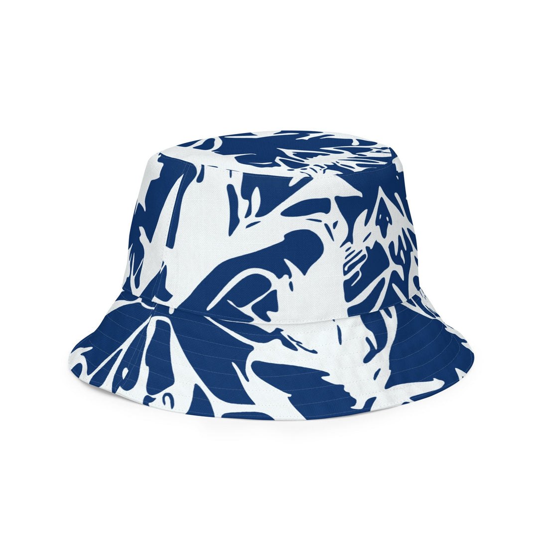 reversible bucket hat with abstract print in blue and white by The Gabrielli