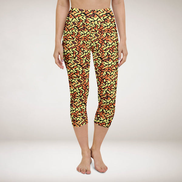 capri yoga leggings with an abstract print in orange, yellow and brown by The Gabrielli