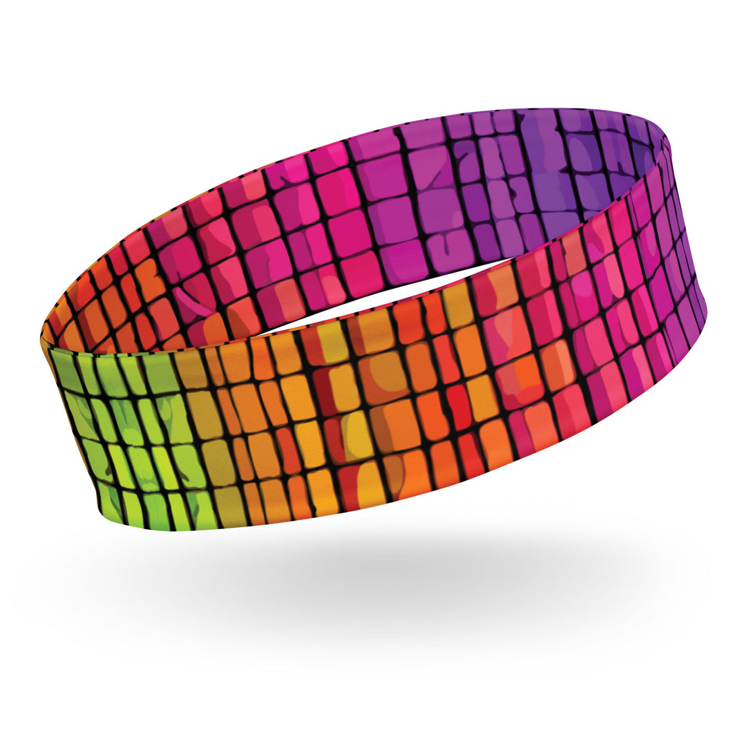 headband with an 80s-inspired rainbow print by The Gabrielli