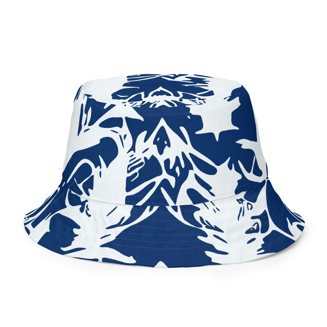 reversible bucket hat with abstract print in blue and white by The Gabrielli