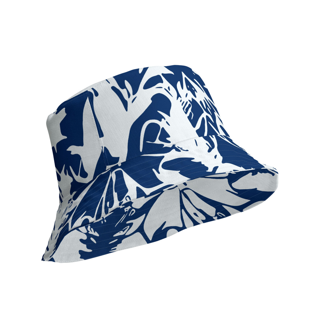 reversible bucket hat with abstract print in blue and white by The Gabrielli