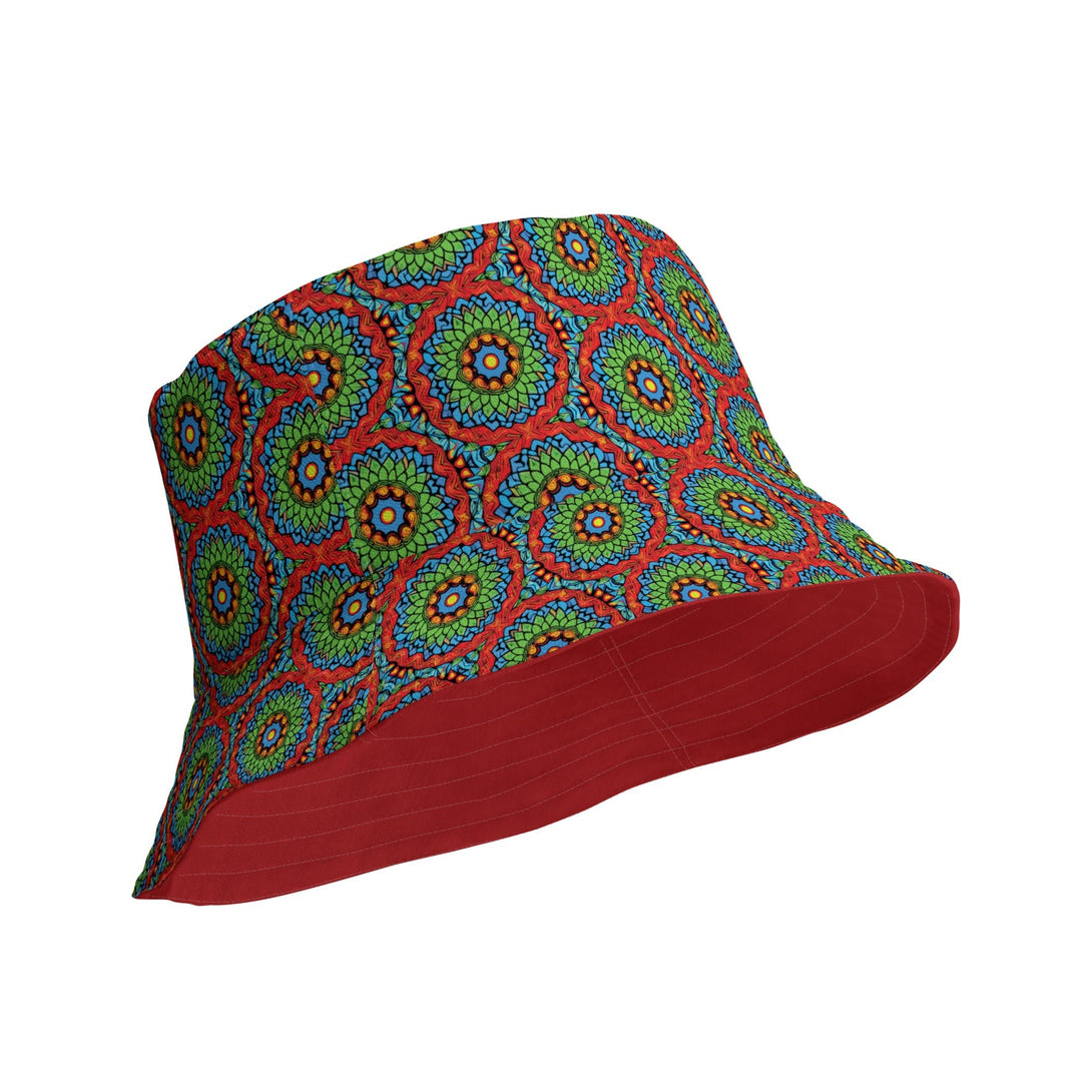 reversible bucket hat with an abstract print in green, blue, red and orange by The Gabrielli